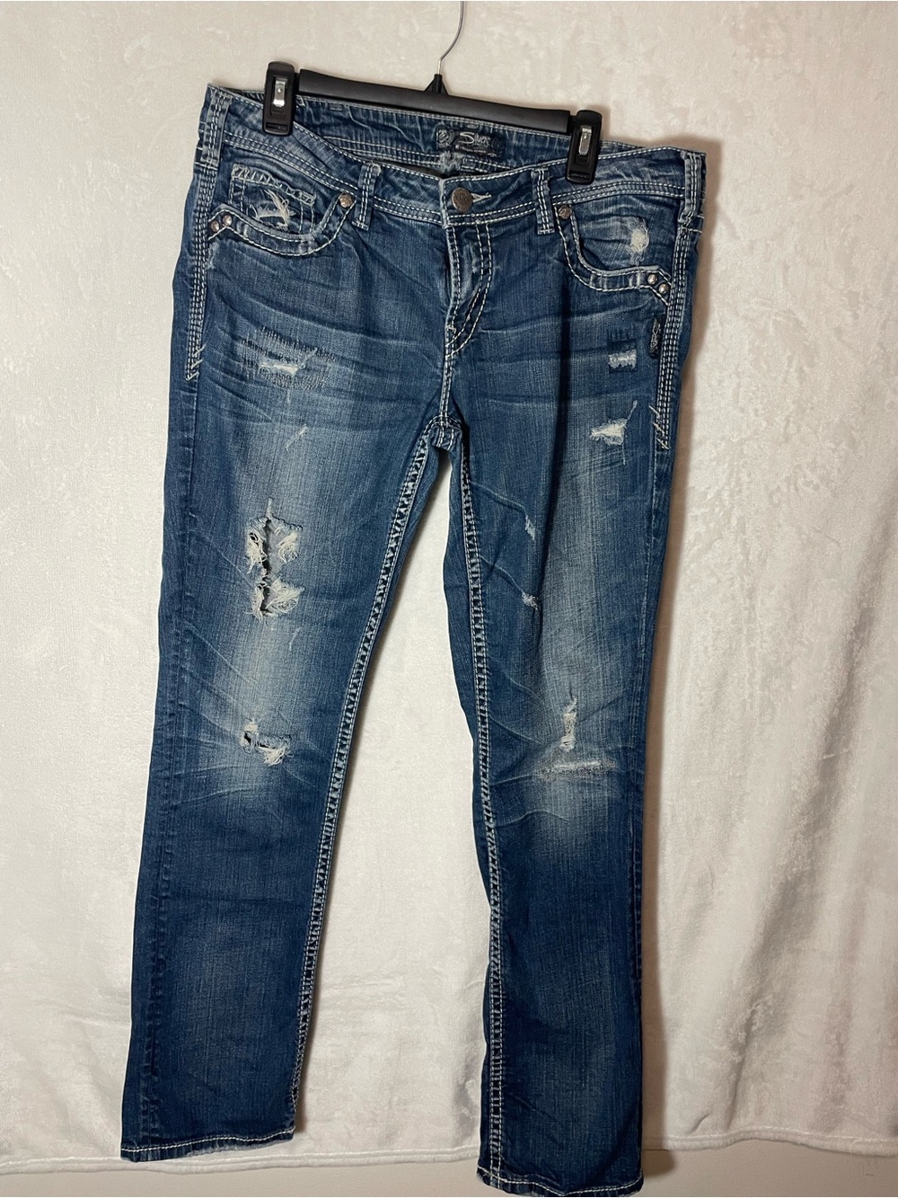 Silver Jeans Distressed Blue Boot Cut Jeans